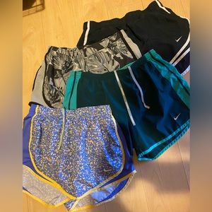 Lot of 4 Nike running shorts with brief liner.